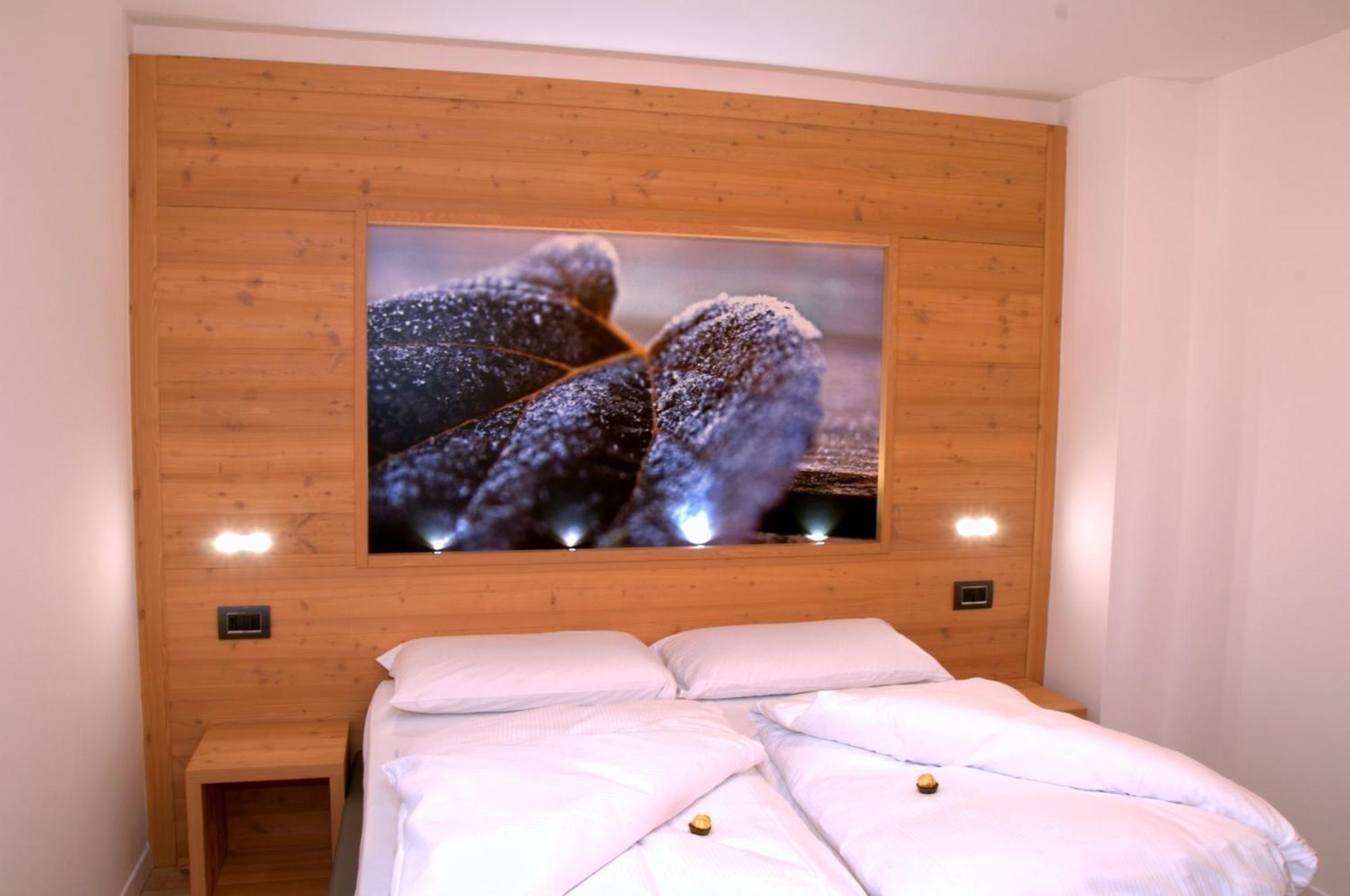 Relais Fior Di Bosco Aparthotel Folgaria Bagian luar foto